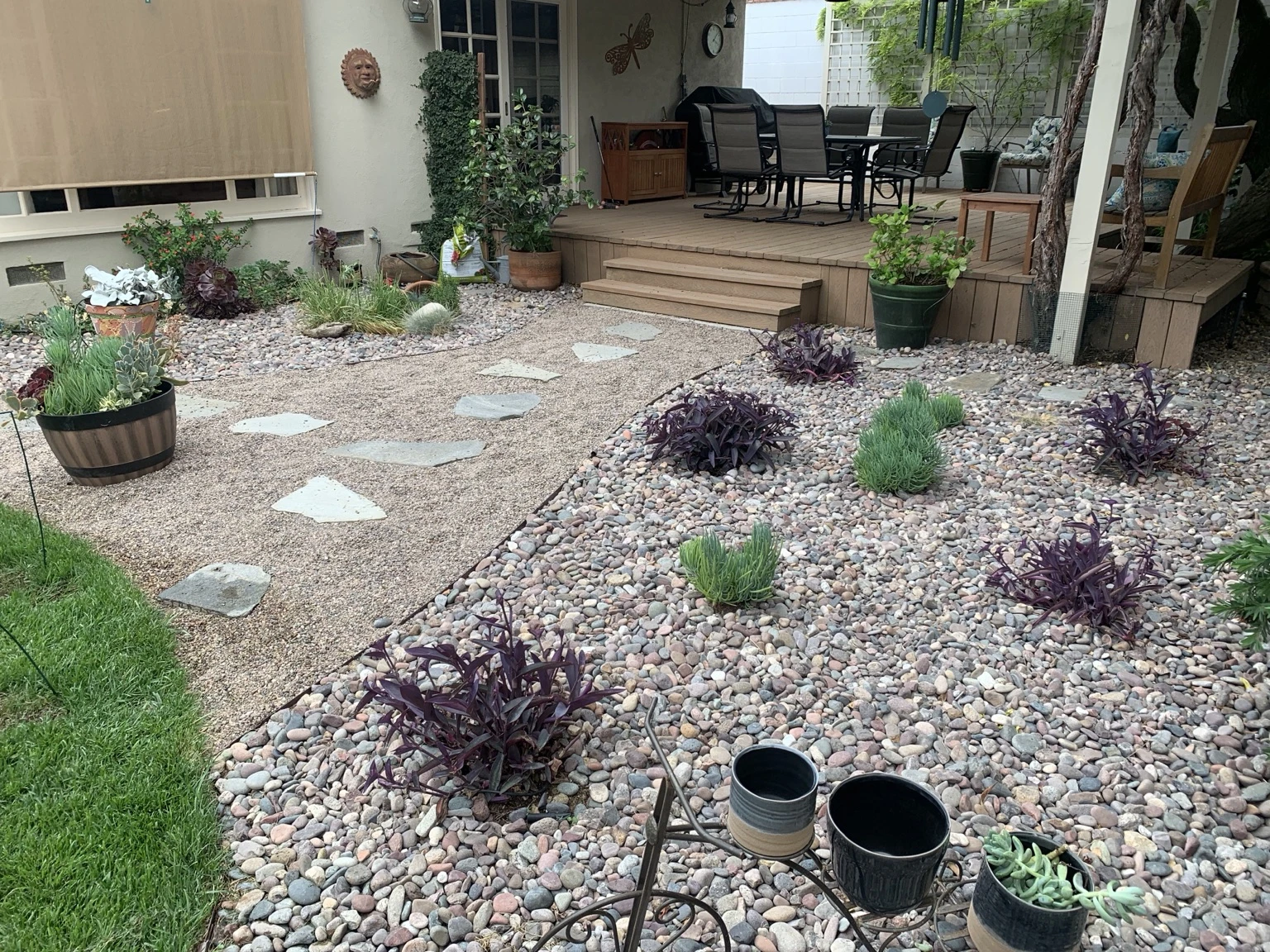 A planted gravel garden beside a patio